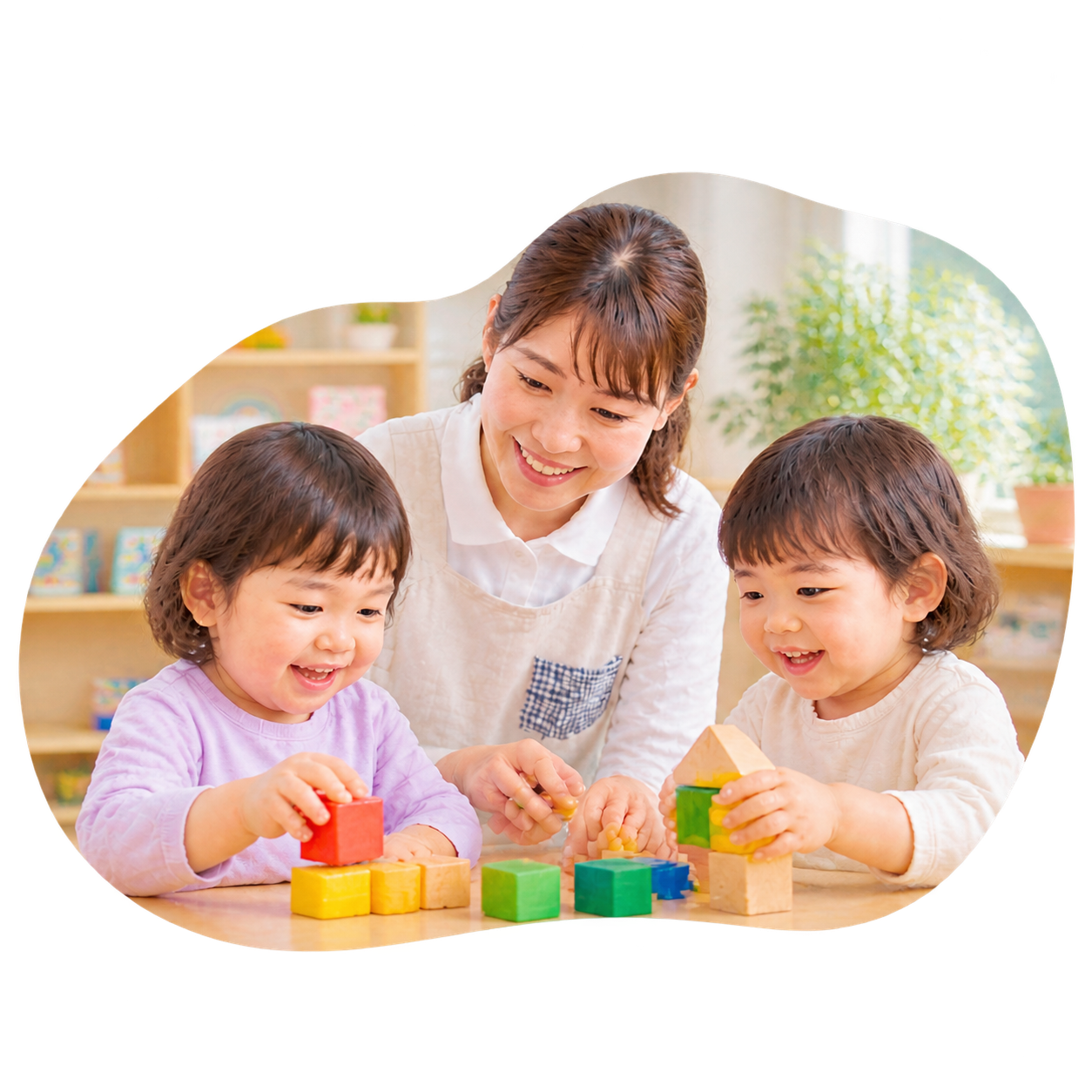 先生と子どもたちが積み木で遊んでいる様子